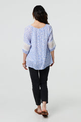Animal Print Tassel Bardot Neck Blouse
