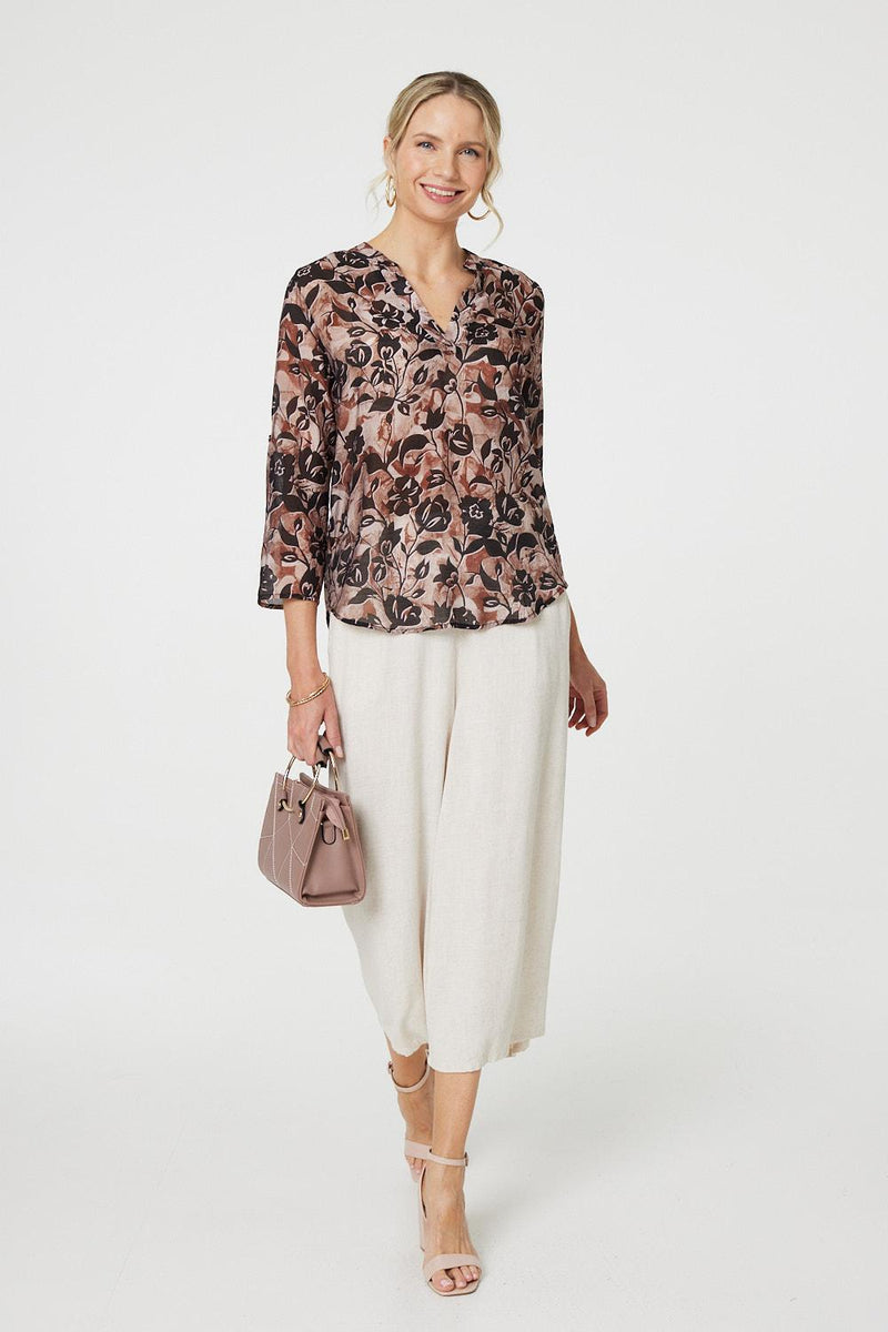 Floral 3/4 Sleeve Curve Hem Blouse