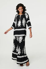 Ikat Print Tassel Tie Neck Blouse