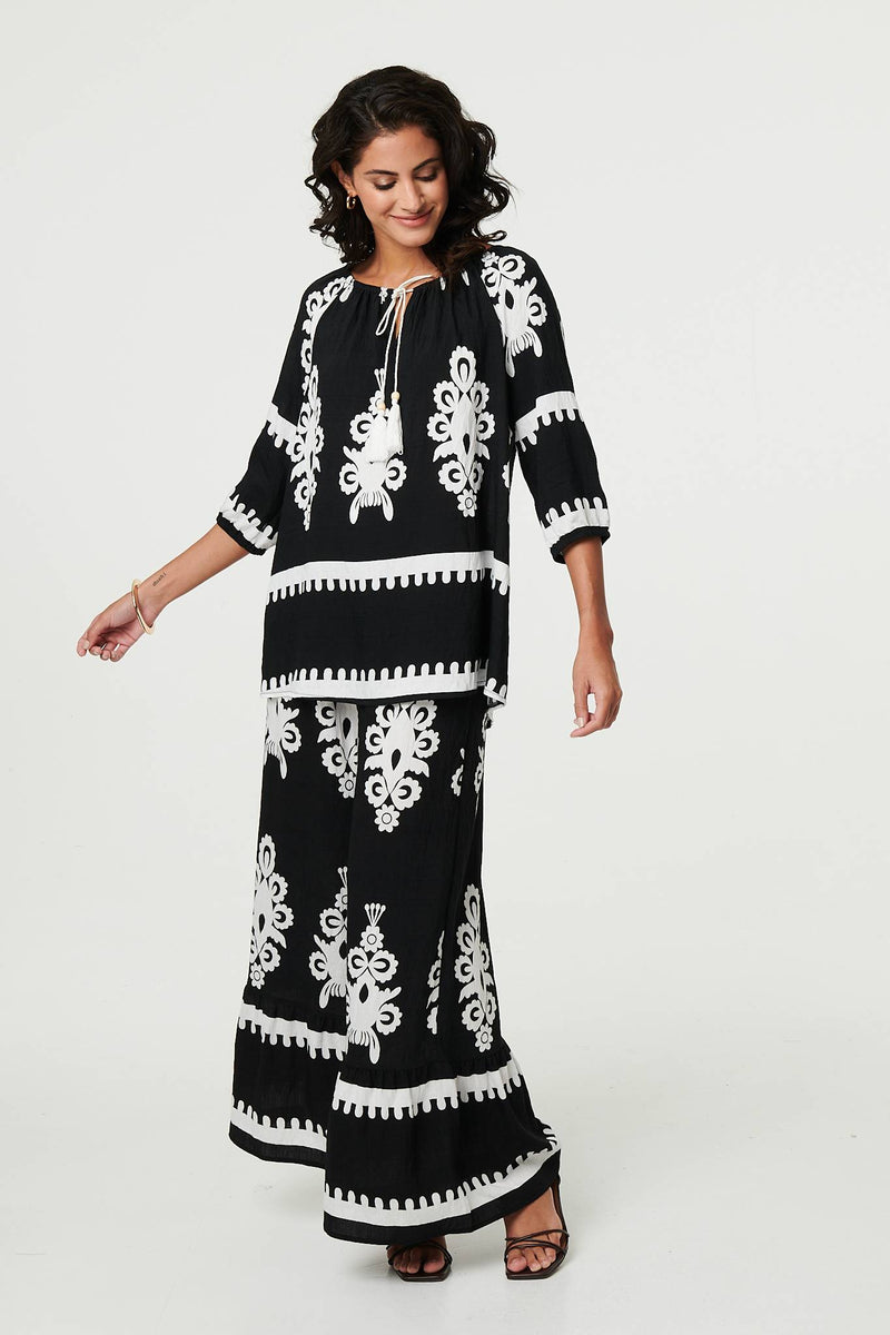 Ikat Print Tassel Tie Neck Blouse