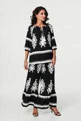 Ikat Print Tassel Tie Neck Blouse