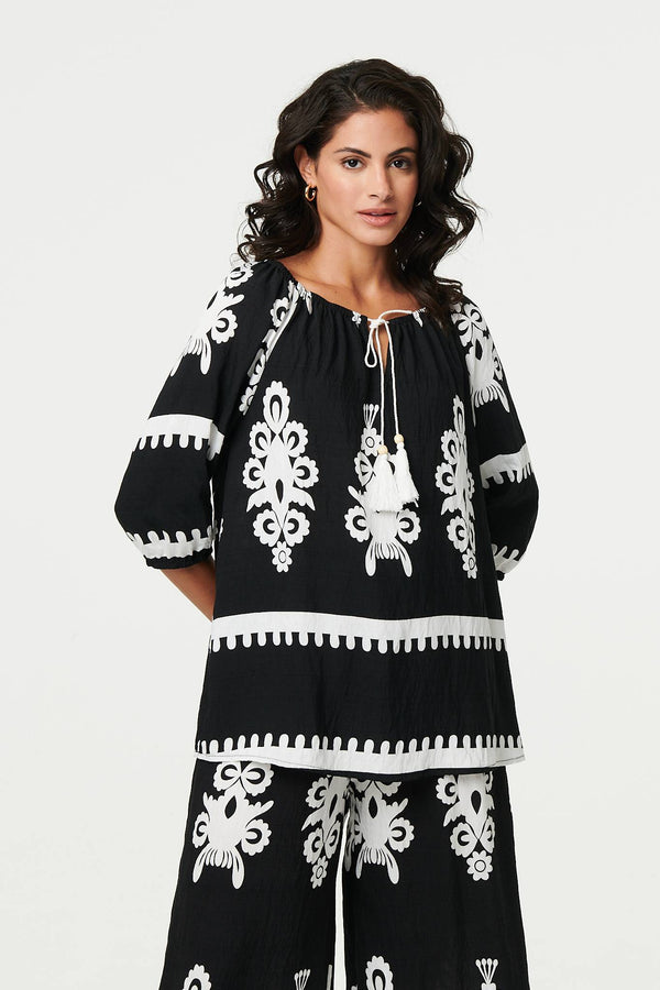 Ikat Print Tassel Tie Neck Blouse
