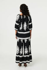 Ikat Print Tassel Tie Neck Blouse