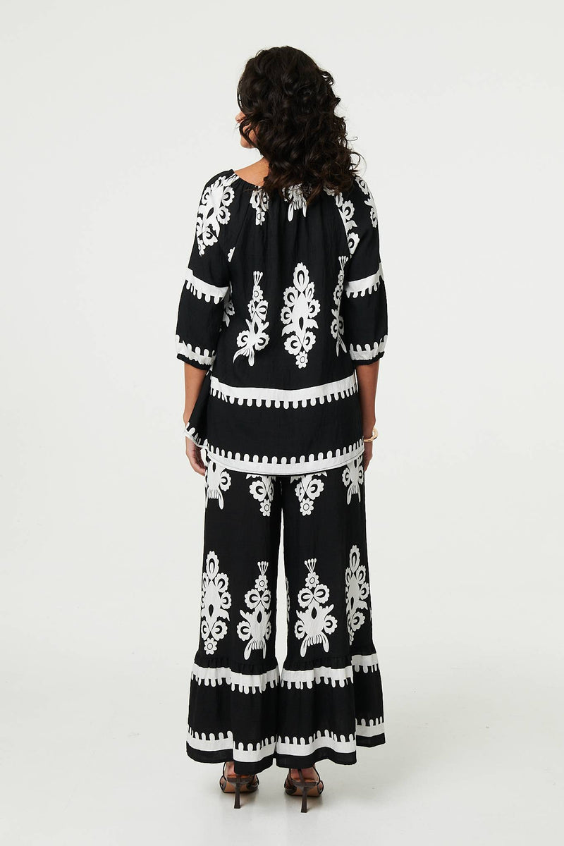 Ikat Print Tassel Tie Neck Blouse