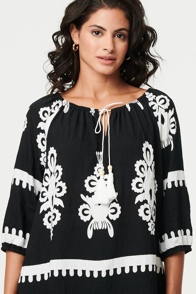 Ikat Print Tassel Tie Neck Blouse