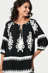 Ikat Print Tassel Tie Neck Blouse