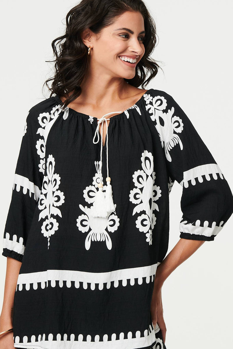 Ikat Print Tassel Tie Neck Blouse