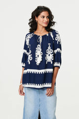 Ikat Print Tassel Tie Neck Blouse
