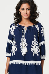 Ikat Print Tassel Tie Neck Blouse