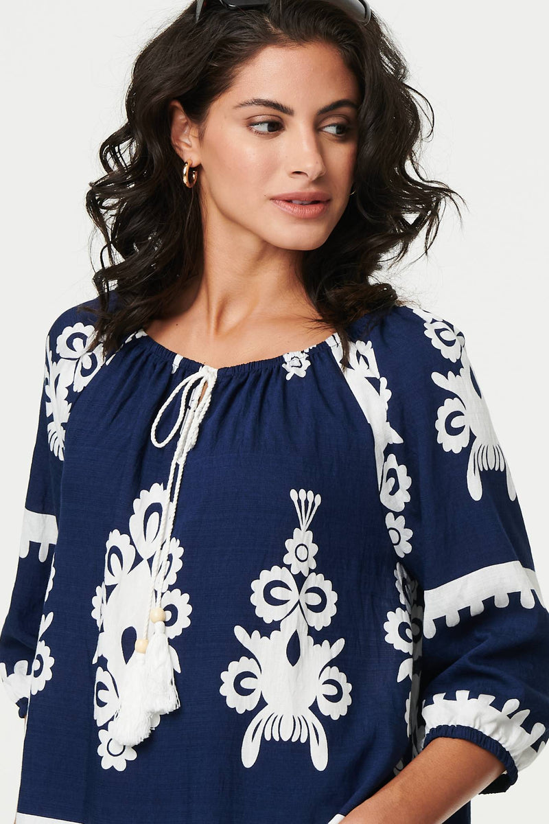 Ikat Print Tassel Tie Neck Blouse