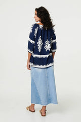 Ikat Print Tassel Tie Neck Blouse