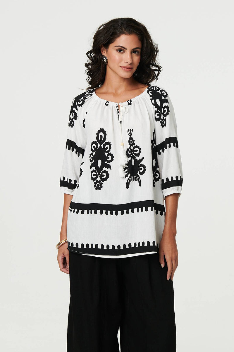 Ikat Print Tassel Tie Neck Blouse