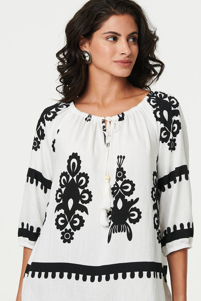 Ikat Print Tassel Tie Neck Blouse