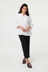 Relaxed 3/4 Sleeve Button Neck Blouse